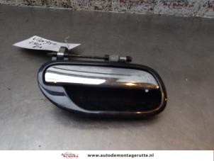 O166344 Gebruikte portiergreep 4deurs rechts-achter Volvo V40
