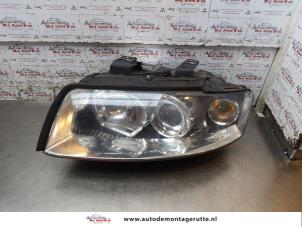 O166367 Gebruikte koplamp links Audi A4
