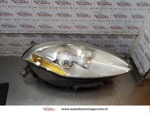O166535 Gebruikte rechter koplamp Fiat Bravo