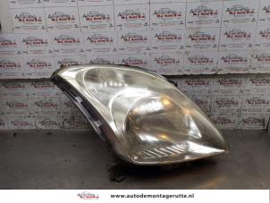 O166578 Gebruikte koplamp rechts Suzuki Swift