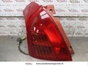O166582 Gebruikte achterlicht links Suzuki Swift