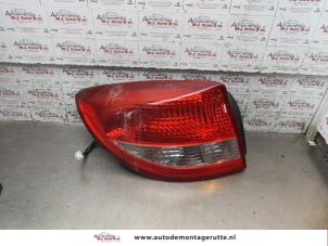 O166734 Gebruikte achterlicht links Kia Rio