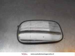 O166783 Gebruikte spiegelglas links Nissan Micra