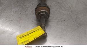 O166900 Gebruikte homokineetas links-voor Nissan Almera