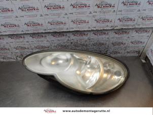 O166939 Gebruikte linker koplamp Chrysler PT Cruiser