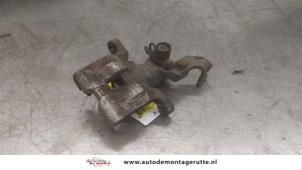 O166979 Gebruikte remklauw (tang) rechts-achter Mazda 6.
