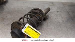 O167012 Gebruikte schokdemperpoot links-voor Peugeot 206