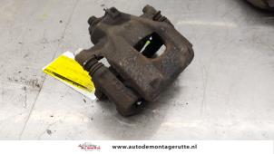O167044 Gebruikte remklauw (tang) links-voor Citroen C1