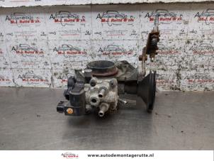 O167069 Gebruikte gasklephuis Daihatsu Materia