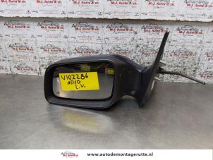 O167104 Gebruikte spiegel buiten links Opel Astra