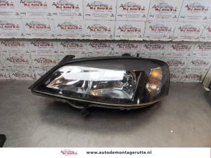 O167278 Gebruikte linker koplamp Opel Astra