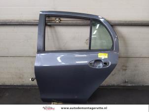 O167426 Gebruikte portier 4deurs links-achter Toyota Yaris