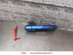 O167525 Gebruikte portiergreep 4deurs rechts-achter Toyota Yaris