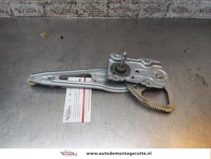 O167535 Gebruikte ruitmechaniek 4deurs links-achter Toyota Yaris
