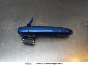 O167544 Gebruikte portiergreep 4deurs links-achter Toyota Yaris