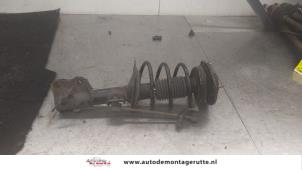 O167719 Gebruikte schokdemperpoot links-voor Volvo V40