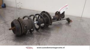 O167711 Gebruikte schokdemperpoot links-voor Opel Meriva