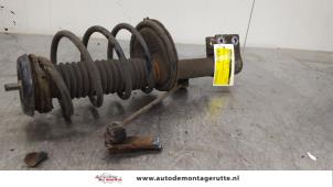 O167722 Gebruikte schokdemperpoot links-voor Peugeot 307