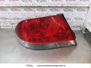 O167721 Gebruikte achterlicht links Mitsubishi Lancer