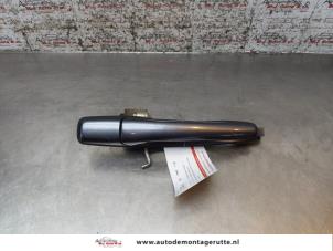O167767 Gebruikte portiergreep 4deurs rechts-achter Mitsubishi Lancer