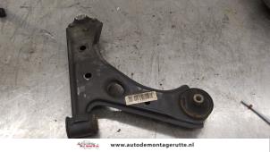 O167795 Gebruikte draagarm onder rechts-voor Opel Corsa