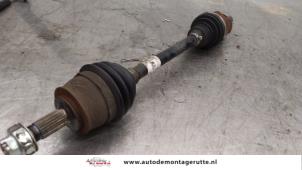 O167808 Gebruikte homokineetas links-voor Opel Corsa