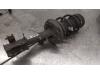 Opel Corsa E 1.4 16V Mac Phersonpoot links-voor