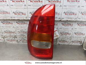 O167909 Gebruikte achterlicht links Opel Corsa