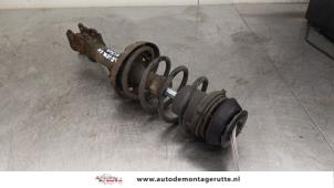 O168128 Gebruikte schokdemperpoot links-voor Opel Zafira