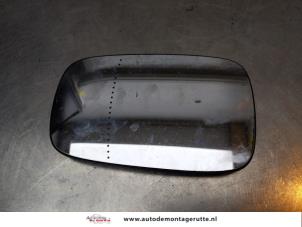 O168280 Gebruikte spiegelglas links Renault Clio