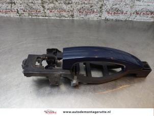O168362 Gebruikte portiergreep 4deurs links-voor Ford Focus