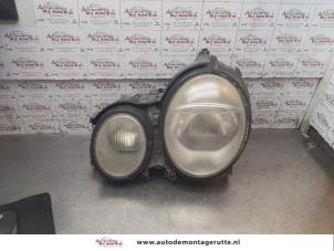 O168911 Gebruikte koplamp links Mercedes E-Klasse