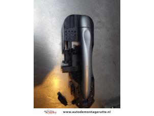 O169057 Gebruikte portiergreep 4deurs rechts-voor Renault Scenic