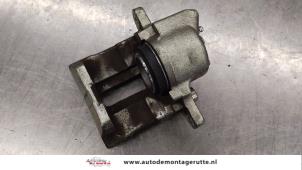 O169081 Gebruikte remklauw (tang) links-voor Renault Clio