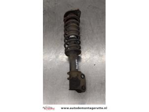 O169100 Gebruikte schokdemperpoot links-voor Suzuki Alto