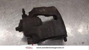 O169126 Gebruikte remklauw (tang) links-voor Opel Astra