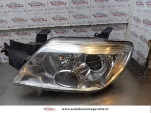 O169177 Gebruikte koplamp links Mitsubishi Outlander