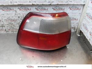 O169344 Gebruikte achterlicht links Opel Omega