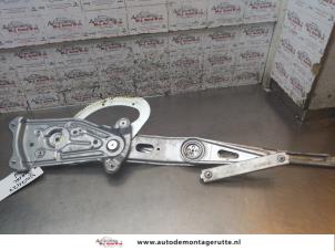 O169425 Gebruikte raammechaniek 4deurs rechts-voor Renault Scenic