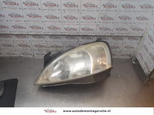 O169500 Gebruikte linker koplamp Opel Corsa