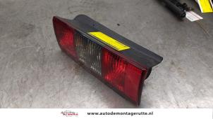 O169830 Gebruikte achterlicht links Opel Combo