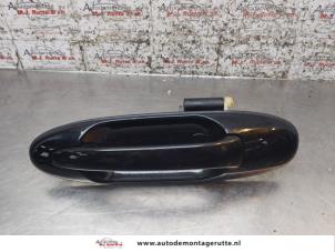O169858 Gebruikte portiergreep 4deurs links-achter Toyota Landcruiser