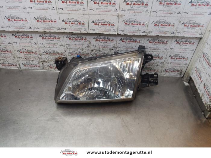 Gebruikte Koplamp links Mazda Demio O169878