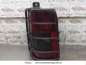 O169946 Gebruikte achterlicht links Peugeot Partner