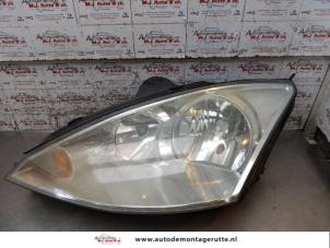 O170109 Gebruikte linker koplamp Ford Focus