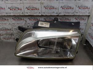O170125 Gebruikte linker koplamp Peugeot Partner