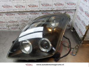 O170242 Gebruikte linker koplamp Suzuki Swift