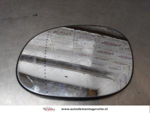 O170496 Gebruikte spiegelglas links Peugeot 206
