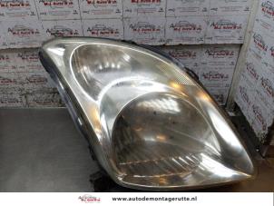 O170517 Gebruikte koplamp rechts Suzuki Swift