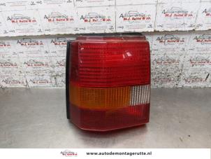 O170575 Gebruikte achterlicht links Ford Escort
